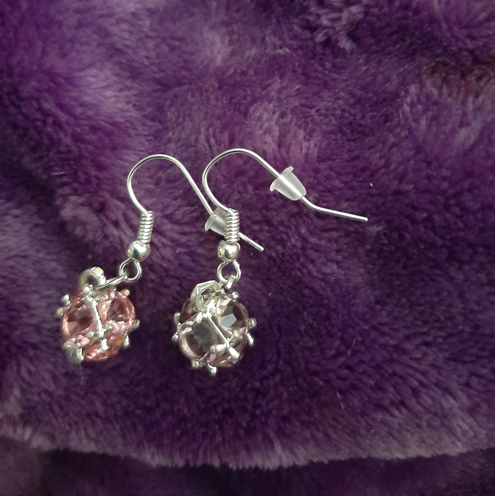 Pink crystal and silver earrings.